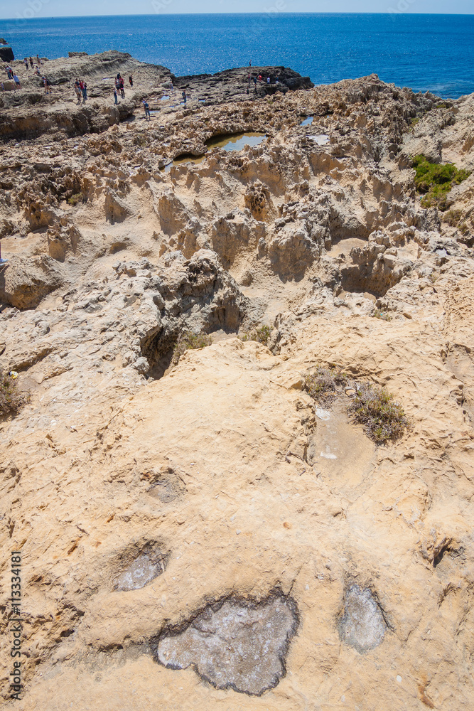Salt crystallizes on the rocks at the Azure Window. Salt crystallizes on the rocks at the Azure Window.