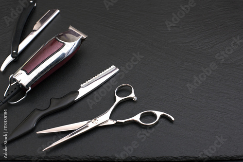 Obraz na plátne Barber shop tools on Black with place for text.