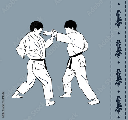 Men demonstrate karate, hieroglyph of karate.