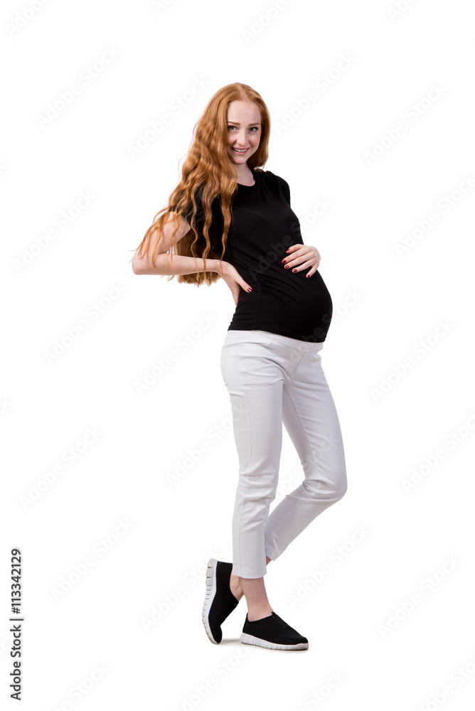 Young pregnant woman isolated on white