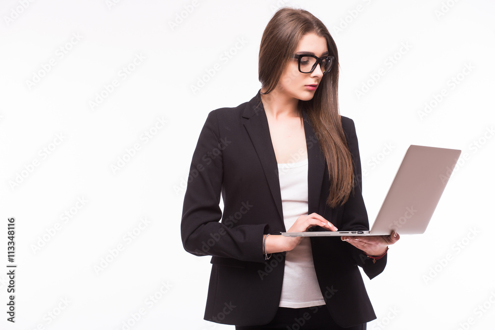 Successful business woman holding a laptop - isolated over white Successful business woman holding a laptop - isolated over white
