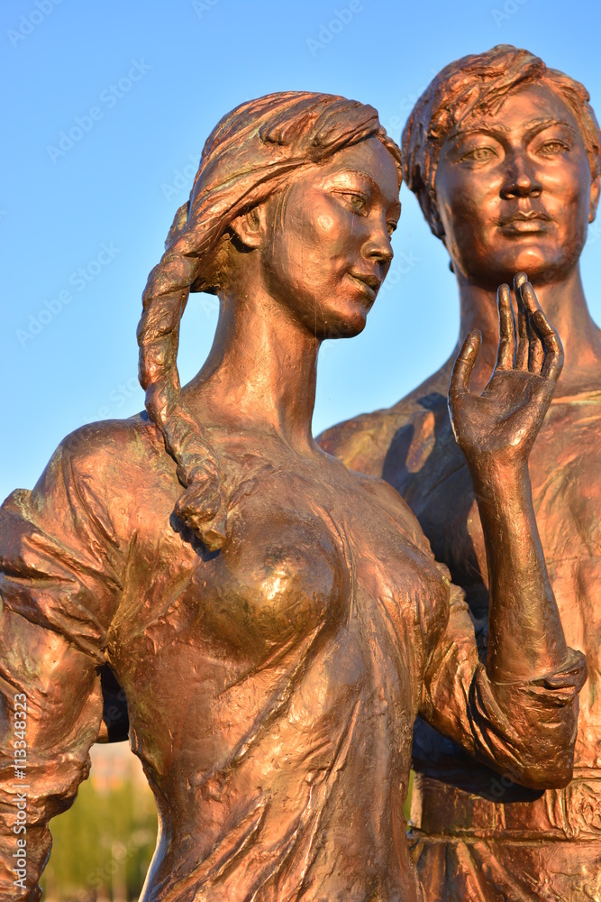 Astana, capital of Kazakhstan - Street sculpture featuring a loving couple 