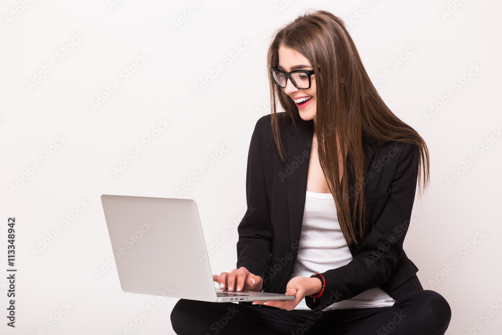 Business woman work on laptop in hands on white background Business woman work on laptop in hands on white background