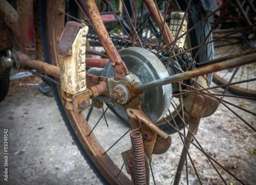 Rusty chain-wheel and old bicycle, Selective focus and close up