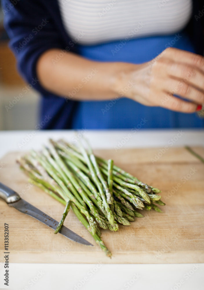 Close-up of asparagus on cutting board Close-up of asparagus on cutting board
