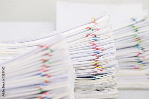 Pile paperwork have blur overload document as foreground and background