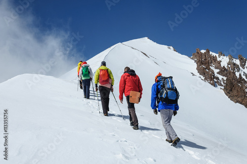 Group climbers goes down from the top of Erciyes volcano.