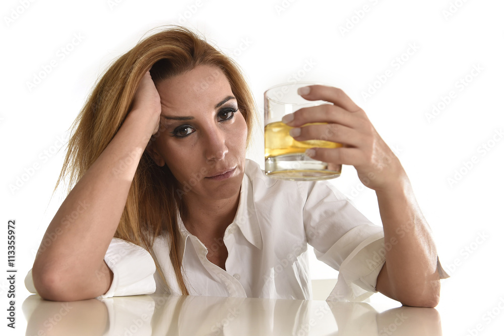 caucasian blond wasted and depressed alcoholic woman drinking scotch whiskey glass messy drunk caucasian blond wasted and depressed alcoholic woman drinking scotch whiskey glass messy drunk