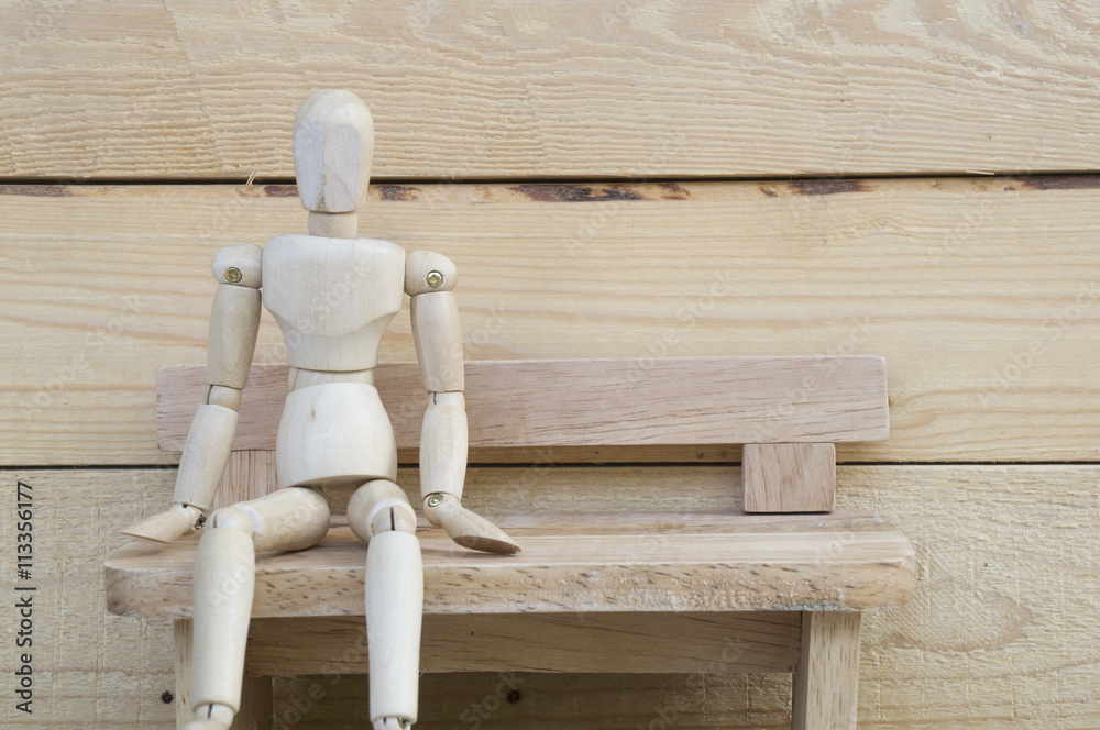 dummy wood man acting alone wooden chair dummy wood man acting alone wooden chair
