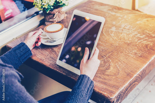 Wallpaper Mural asian woman hand holding tablet and using tablet in coffee shop Torontodigital.ca