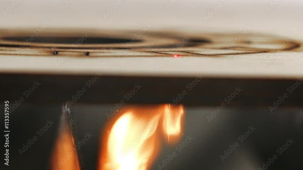 Laser cutting on wood. Slow motion. Laser cutting on wood. Slow motion.