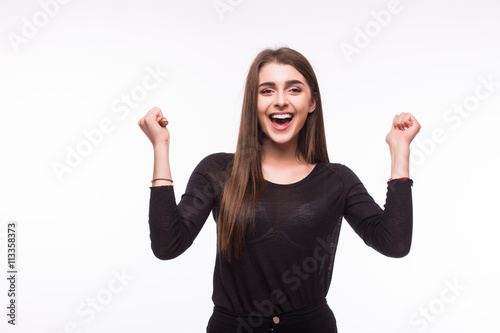Surprised excited happy screaming woman isolated. Cheerful girl winner shocked over winning with funny joyful face expression.