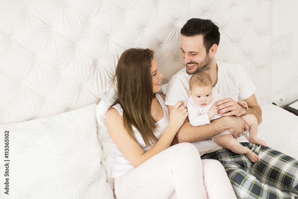 Happy family with newborn baby