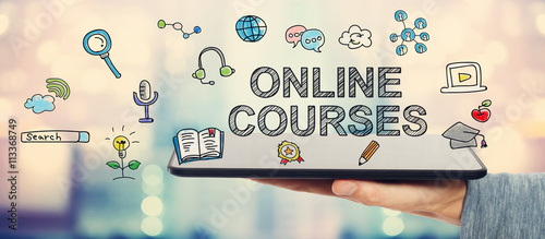 Online Courses concept with man holding tablet photo