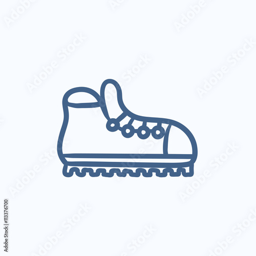Hiking boot with crampons sketch icon.