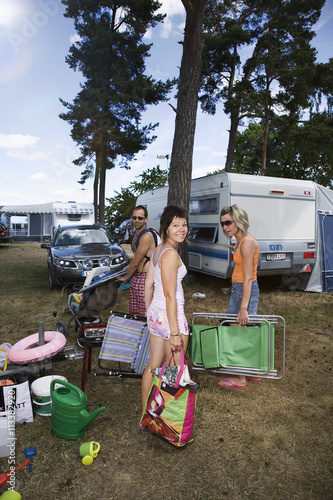 Man and women on campingsite photo