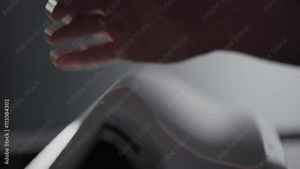Mechanic opens car hood