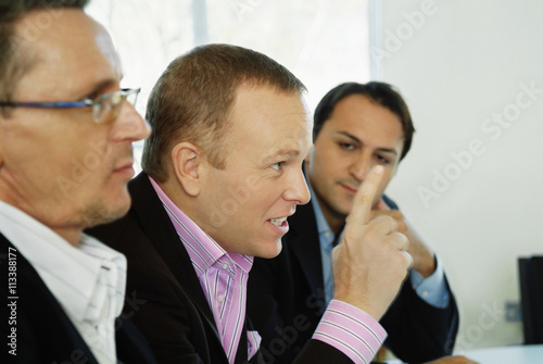 Men in a meeting photo