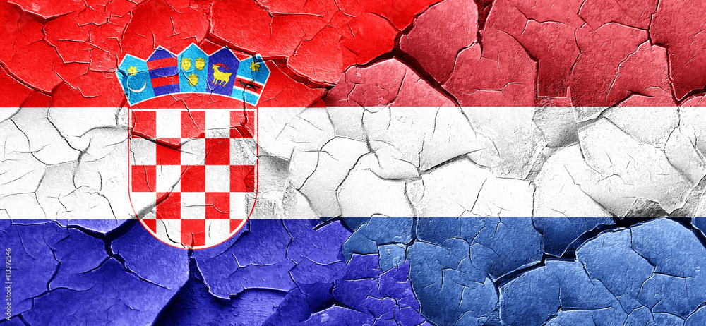 croatia flag with Netherlands flag on a grunge cracked wall
