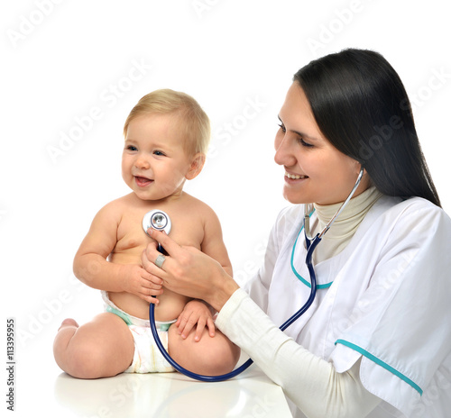 Doctor or nurse auscultating child baby patient heart with steth