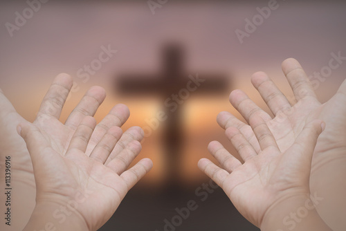 Hands prayer cross