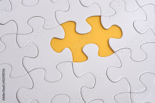 Missing Puzzle on Yellow Background, Searching a Solution 