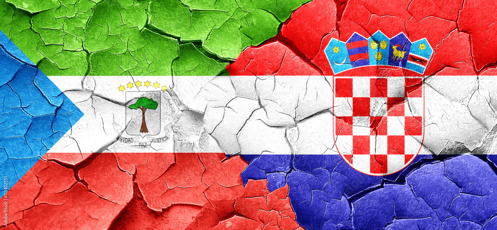 Equatorial guinea flag with Croatia flag on a grunge cracked wal