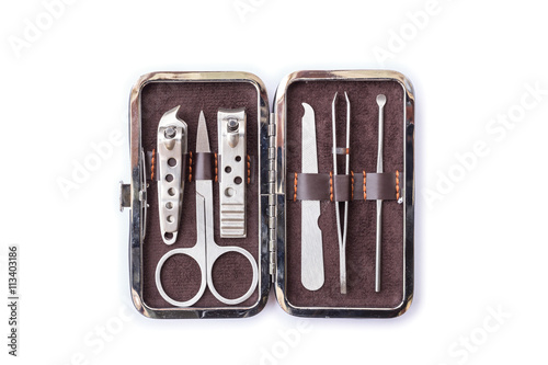 Top view tools of a manicure set in box isolated on white