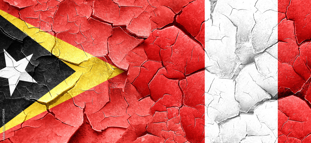 east timor flag with Peru flag on a grunge cracked wall