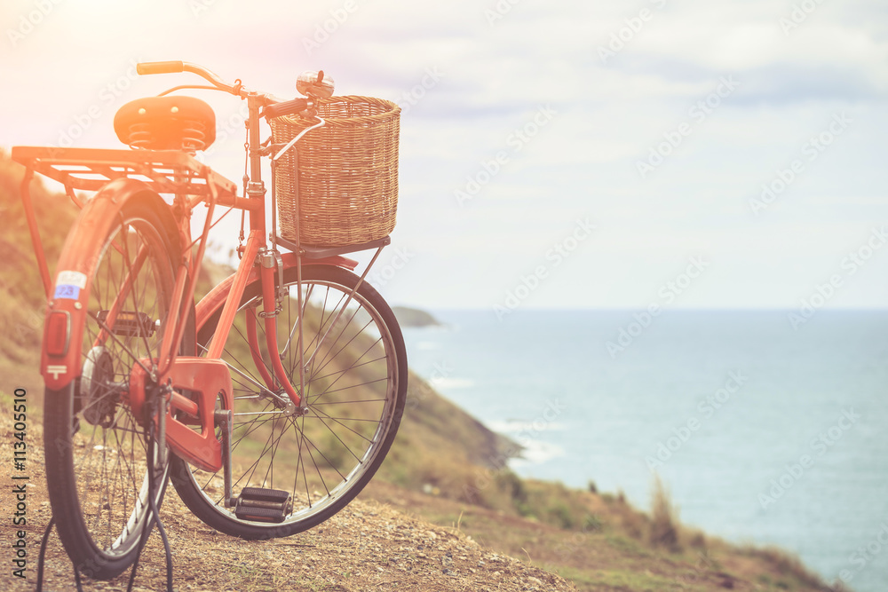 Fototapeta premium Red Japan style classic bicycle at ocean view point
