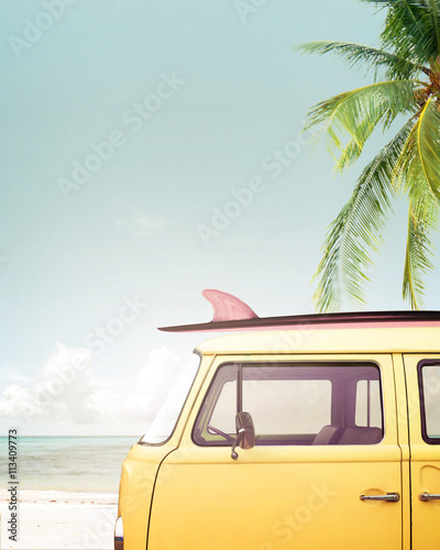 Photography Vintage car parked on the tropical beach (seaside) with a surfboard on the roof