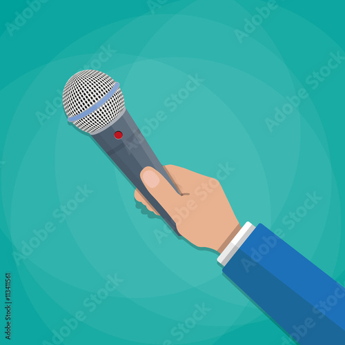 hand holding a microphone