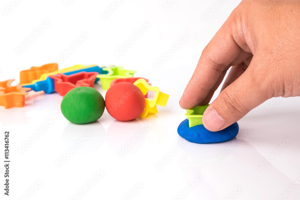 Hand cutting play dough via plastic block Hand cutting play dough via plastic block