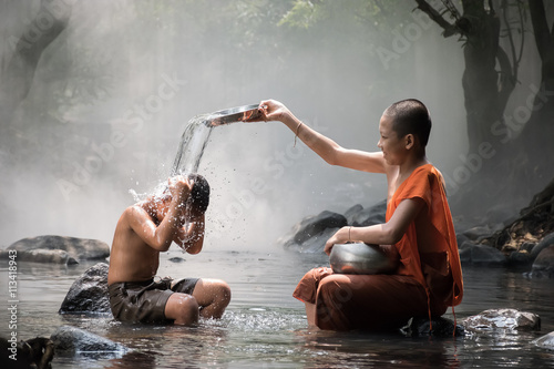 Monk and boy shower