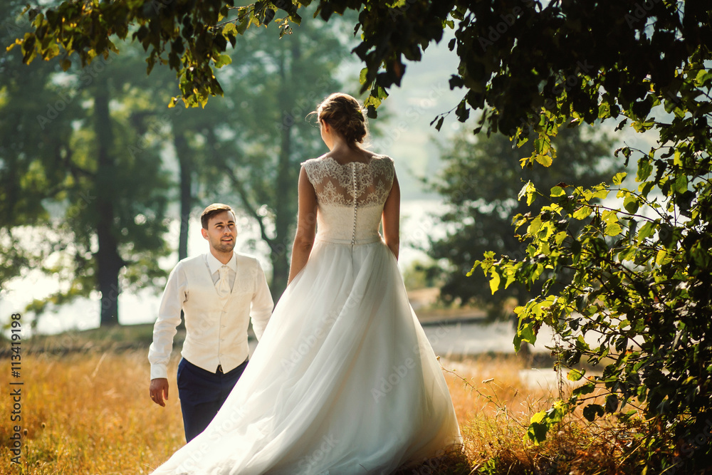 The brides walking in the park The brides walking in the park