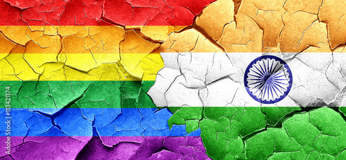 Gay pride flag with India flag on a grunge cracked wall
