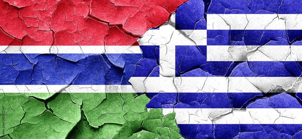 Gambia flag with Greece flag on a grunge cracked wall