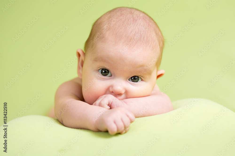 Baby infant kid lying on belly Baby infant kid lying on belly