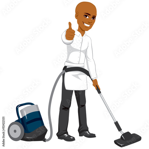 African American male hotel service worker cleaning using vacuum cleaner