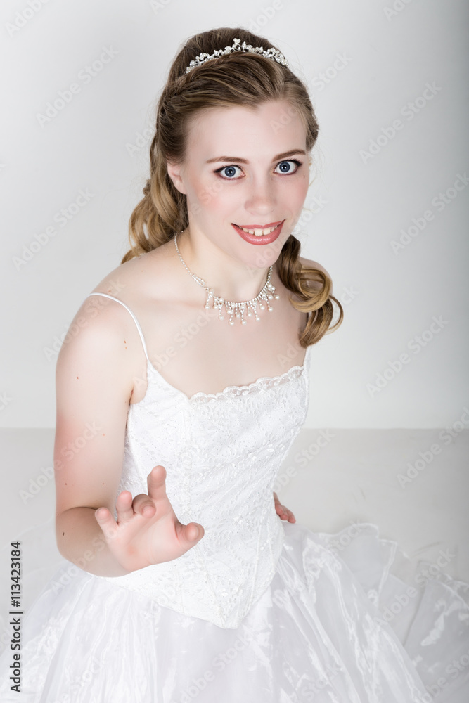 beautiful bride funny posing, expressing different emotions. Beautiful bride with fashion wedding hairstyle. funny bride concept beautiful bride funny posing, expressing different emotions. Beautiful bride with fashion wedding hairstyle. funny bride concept