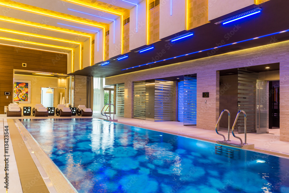 Interior swimming pool in luxury hotel spa center