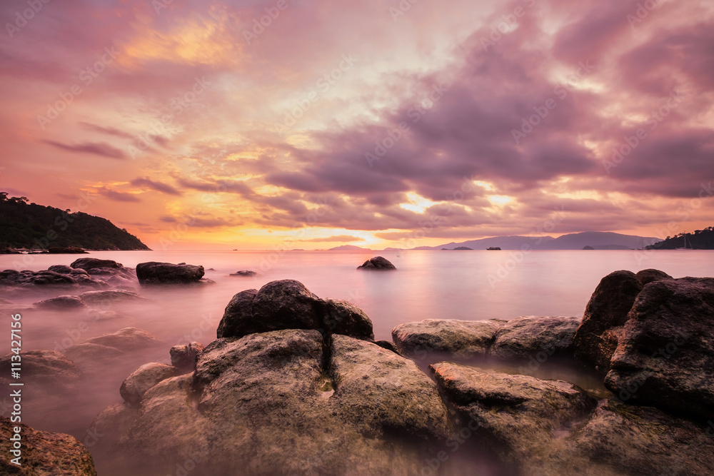 Landscape on the island, Colorful long exposure ocean, vintage tone soft focus, in sunset with amazing sky at on Lipe island in Thailand 