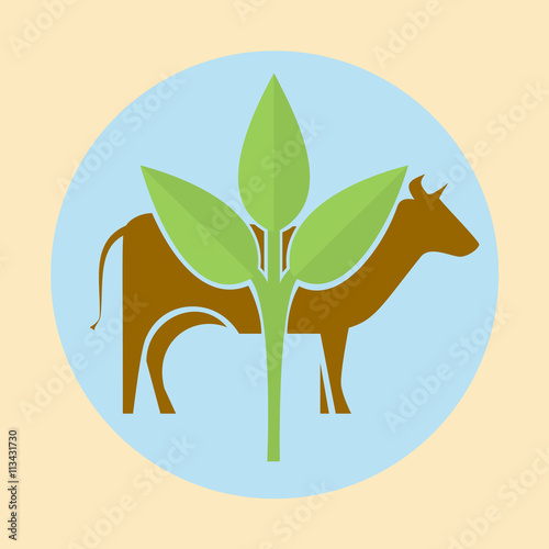Cow silhouette and green leaves