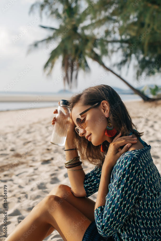 Young pretty girl looking forward to the sea Young pretty girl looking forward to the sea