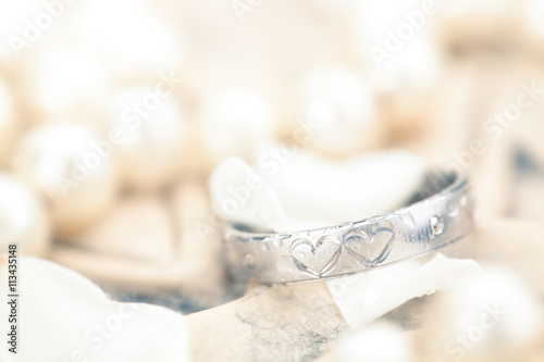 Silver Ring and flower petals.