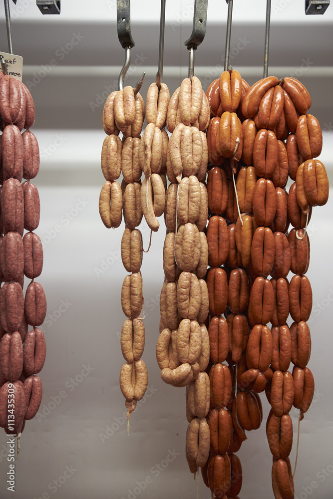 Strings Of Sausages Hanging In Butcher's Cold Store Stock-Foto | Adobe Stock