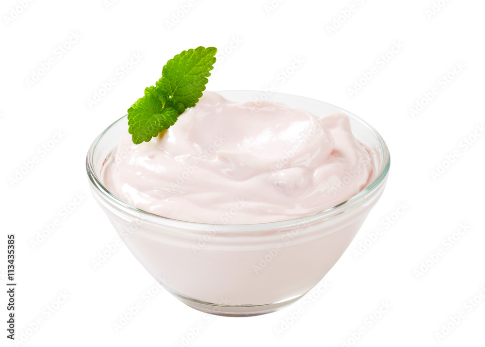 bowl of light pink yogurt bowl of light pink yogurt