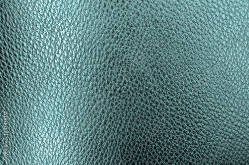 Closeup green leather texture. leather background. and leather surface. for design with copy space for text or image.