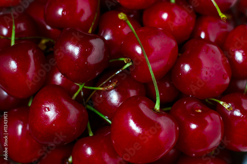 Ripe sweet red cherries background macro