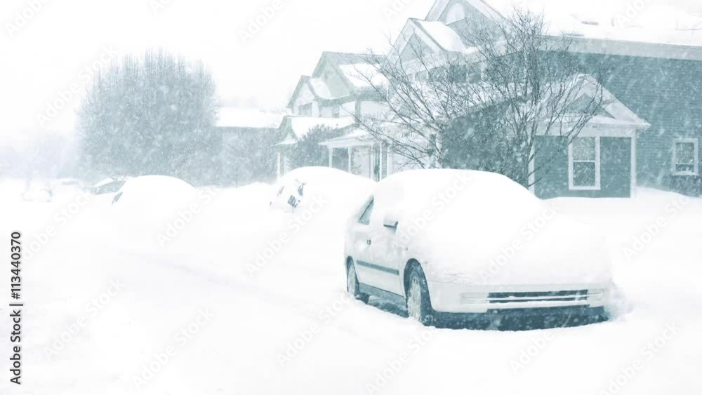 Houses And Cars In Snowstorm